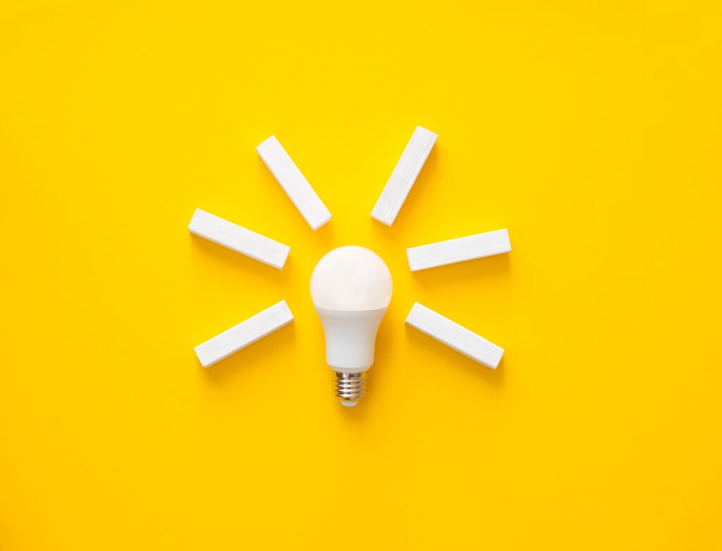 Light bulb with wooden blocks with copy space bus 2024 09 22 17 40 39 utc